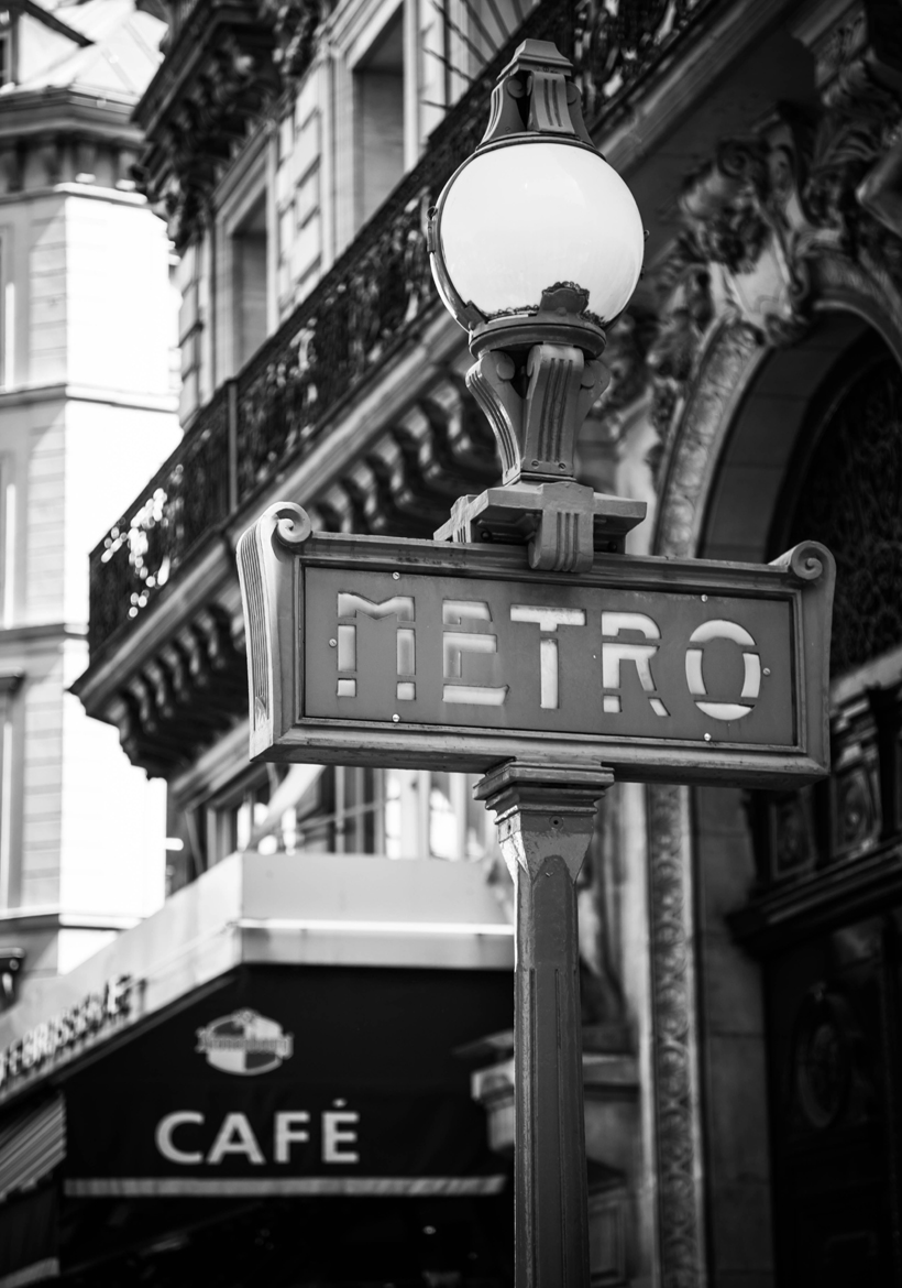 black and white metro sign lamp in london street