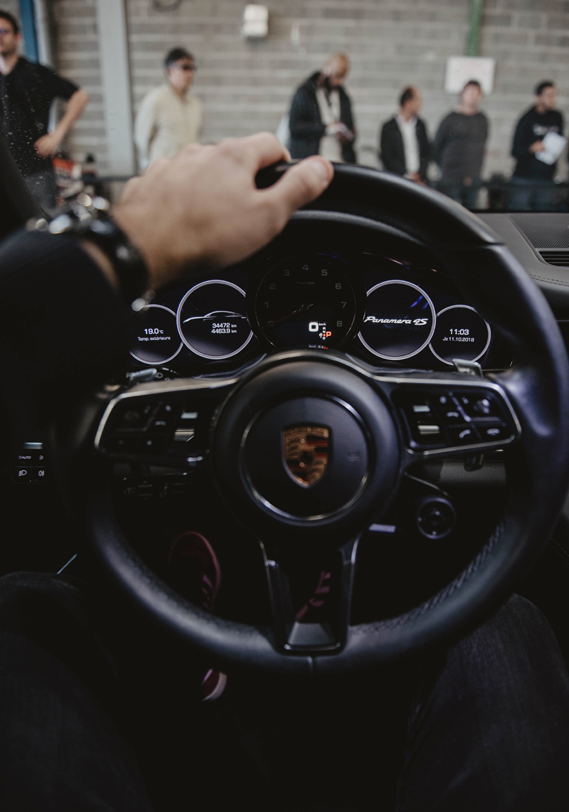 porsche car front staring wheel