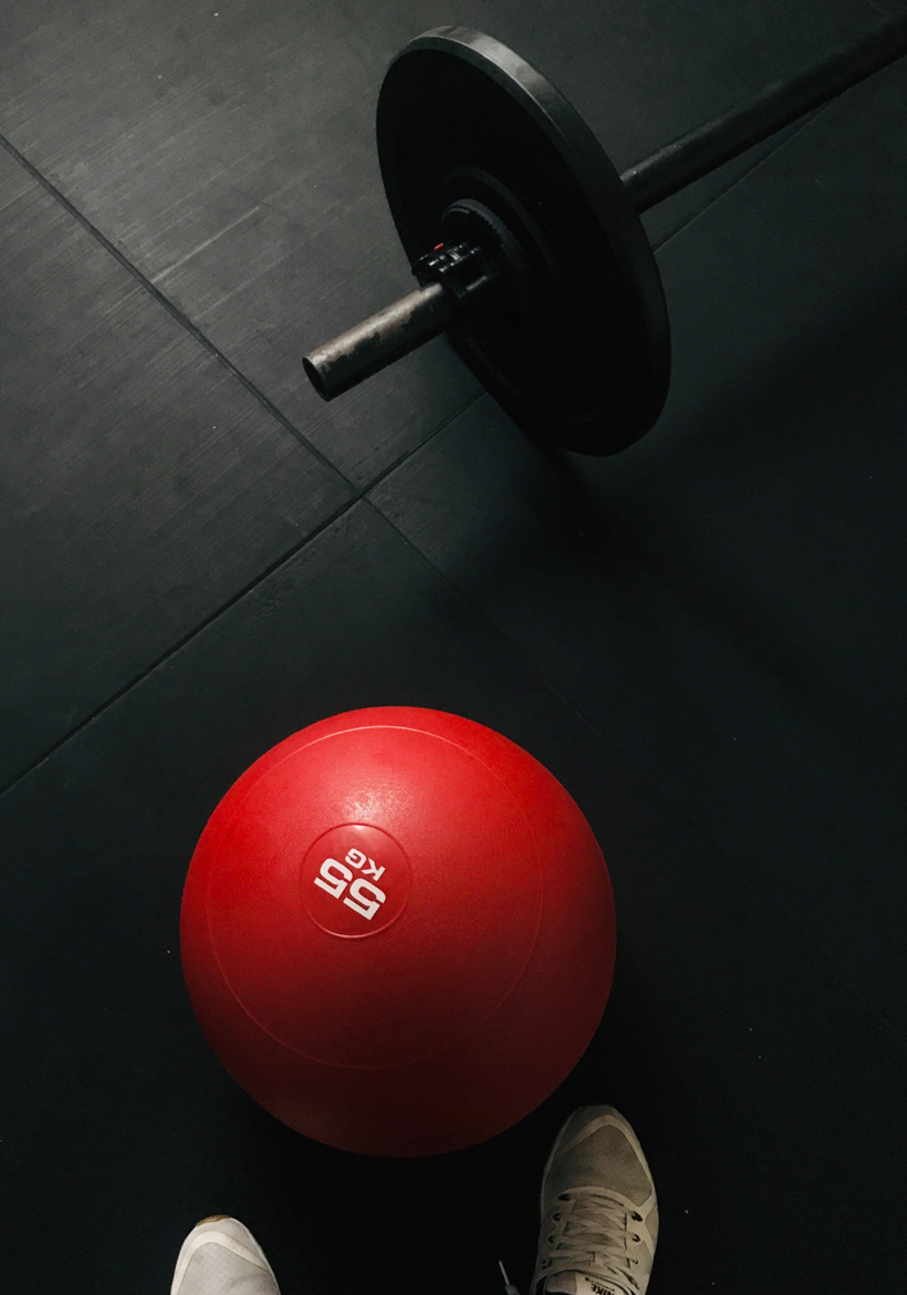 red color weight ball on the floor